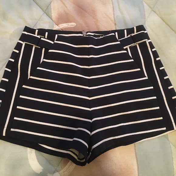 3 shorts and 4 shirts